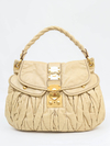 Bolsa Miu Miu Coffer Couro Bege