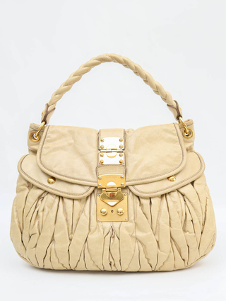 Bolsa Miu Miu Coffer Couro Bege