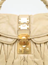 Bolsa Miu Miu Coffer Couro Bege