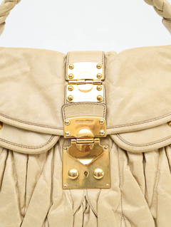Bolsa Miu Miu Coffer Couro Bege