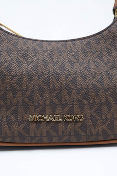 Bolsa Michael Kors Jet Set Cora na internet