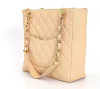 Bolsa Chanel Beige Quilted Caviar Leather Petite Shopping Tote na internet