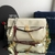 Bolsa de ombro Soft Sound Grande com pingentes na internet