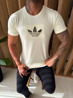 CAMISETA ADIDAS SÍMBOLO DOURADO - OFF WHITE - comprar online