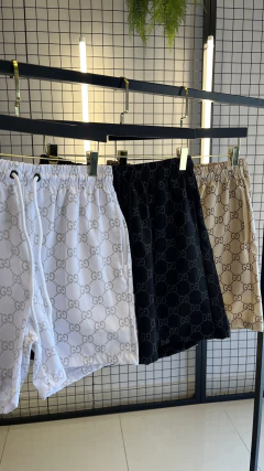 BERMUDA MODA PRAIA GUCCI - BRANCA na internet