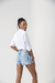 Short Jeans Claro Desfiado na internet