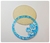 Shaker circular con flor acrílico, glitter azul celeste y resina - comprar online