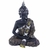 Buda meditando com detalhes em dourado envelhecido