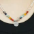 Colar Japamala 108 contas em Pedra 7 Chakras - Cristal