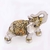 Elefante ouro velho com strass laranja na internet