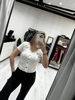 Remera botón