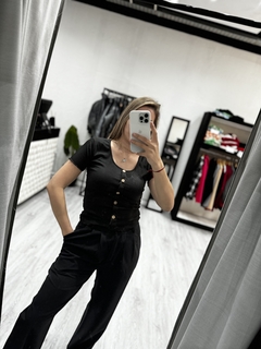 Remera botón en internet