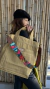 Imagen de BOLSO REVERSIBLE CARRIE - DRAGON PETROLEO CON AVELLANA