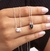Escapulario com Pedra Retangular em Zircônia Cristal e Onix - 70cm na internet