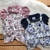 MACACAO CURTO BABY GIJO FLORAL - 1508 na internet