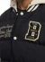 CAMPERA UNIVERSITARIA B NEGRA en internet