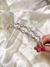 Tiara de cabelo com strass
