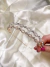 Tiara de cabelo com strass