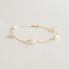 Pulseira em ouro 18k com pérolas barrocas (265) na internet