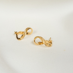 Argola torcida em ouro 18k (220) na internet