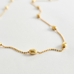Colar sementes em prata 925 com banho de ouro 18k na internet