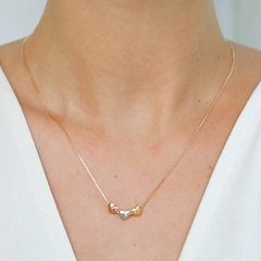Colar com três corações em prata 925 com banho de ouro 18k - comprar online