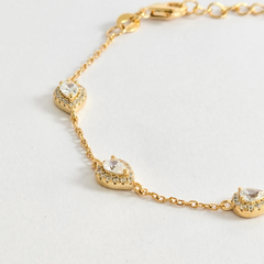 Pulseira gotas em prata 925 com banho de ouro 18k e zircônias transparentes na internet