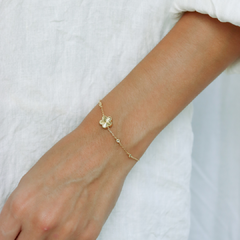 Pulseira flor em prata 925 com banho de ouro 18k e zircônias transparentes - Joalheria Exata