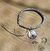 Pulseira Crochet Santa Teresinha 15 Anos Cinza - comprar online