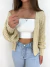 Cardigan curto feminino com manga bufante eli - Santo Conceito
