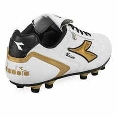 DIADORA BOTIN CLASICO BLANCO NEGRO ORO en internet