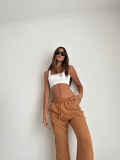 Pantalon Den en internet