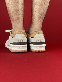 Lacoste 1933 bege laranja Nacional premium na internet