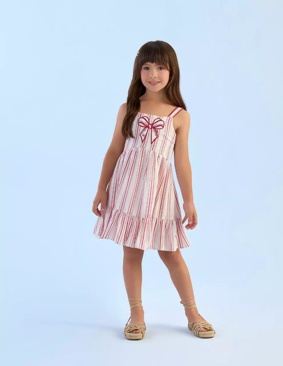 VESTIDO LISTRADO BRANCO E VERMELHO COM APLICAÇÃO DE LAÇO PETIT CHERIE