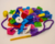 Enhebrado fichas surtidas en bolsa - Playstick