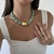 Colar Pedras Orgânicas Verde/Dourado - comprar online