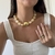 Colar Pedras Orgânicas Off White/Dourado na internet