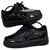 Tenis negros de charol para hombre y mujer con diseño urbano en vista lateral