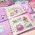 Caderneta de adesivos Sanrio