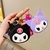 Porta moedas e chaveiro sanrio na internet