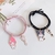 Pulseira kawaii Kuromi e Melody metadinha - comprar online