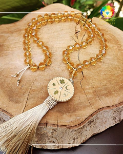 Japamala Cristal Dourado com Símbolos de Proteção e Sorte - comprar online