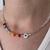 Collar 7 chakras ojito