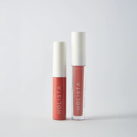 Duo Holista Lips & Cheeks: rubor en crema y bálsamo labial en envases cilíndricos con tapa blanca.