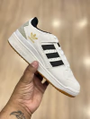 ADIDAS FORUM LATEX PRETO SOLA CARAMELO - comprar online