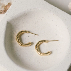 BRINCO MINI BERTHA OURO na internet