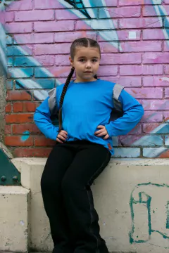 REMERA DASH NIÑA CON Volado GLITTER CELESTE