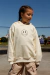 Buzo Oversize The World en internet