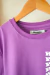 Remera Who Cares (Tipo remerón pero no oversize) en internet