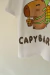 Remerón Oversize Capybara Mochila - comprar online